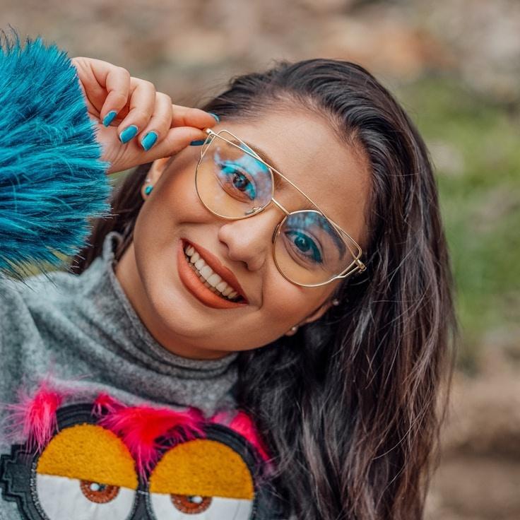 Aanya Kapoor, Lead Design Curator at Astro Nivel Atrix, reviewing corporate floral arrangements